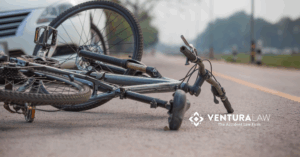 Bicycle lying on the road after a collision with a car in Connecticut.